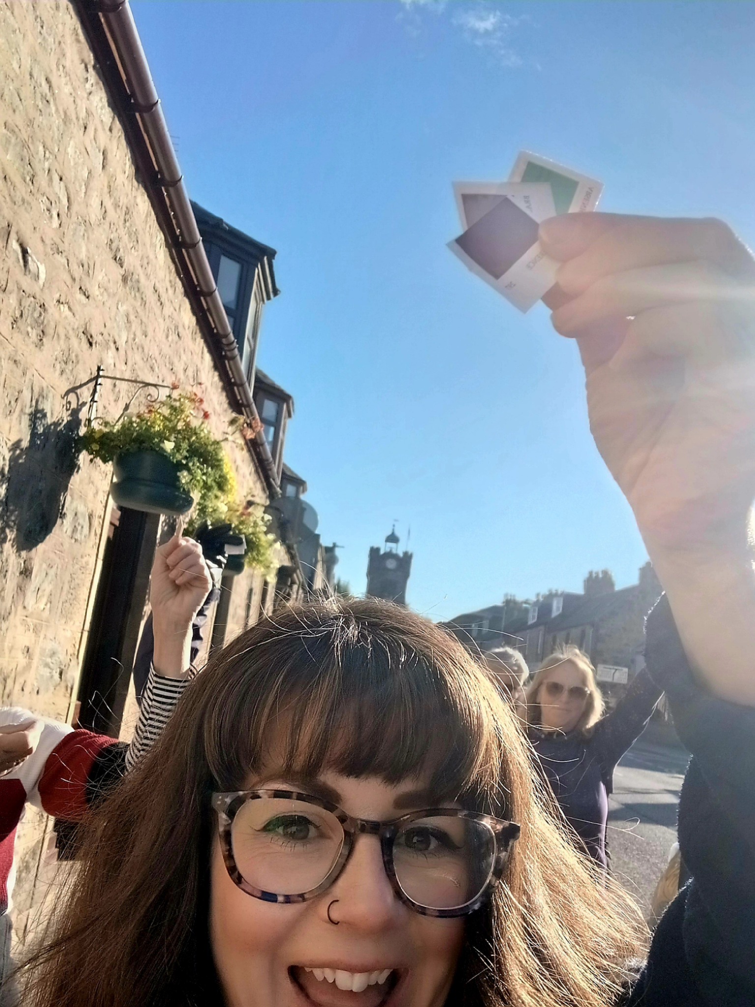 May be an image of 2 people and the Tower of London